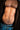 Close-up styling of the black 3EIB Habibi English jockstrap with HABIBI waistband, jeans and dark robe