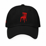 The Kursi Dad Hat — Black with red chair embroidery