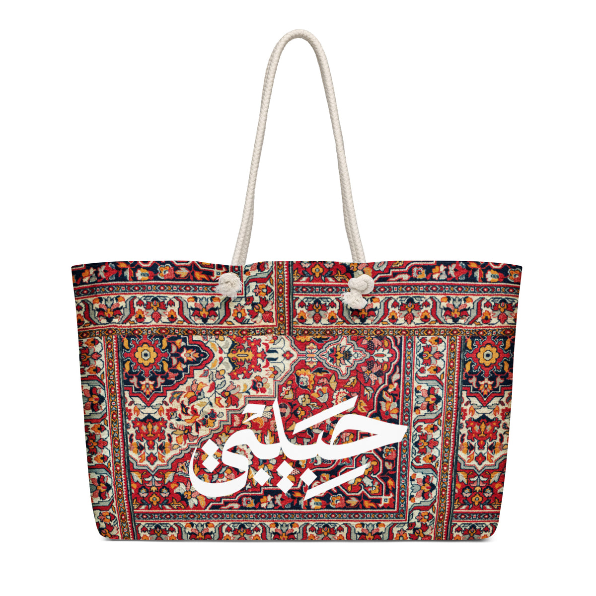 Red rug-print Habibi weekender bag with cream rope handles, back view